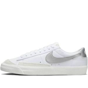 Silver swish Nike shoes